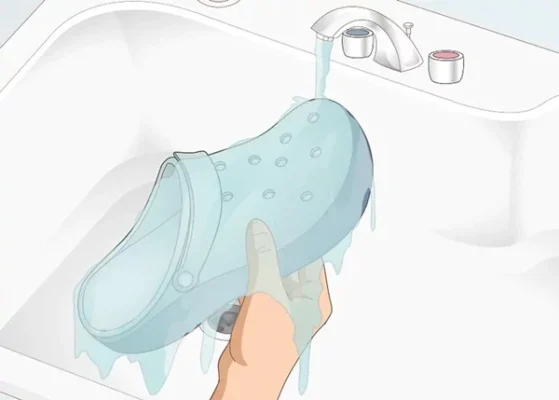 Rinse your Crocs under warm running water